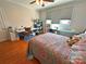 Bright bedroom with hardwood floors, ample storage and natural light, offering a versatile living space at 318 N Laurel N St, Lincolnton, NC 28092