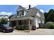 Side view of the house showcasing the architectural details and landscaping at 318 N Laurel N St, Lincolnton, NC 28092