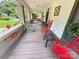 Relaxing front porch featuring classic rocking chairs and ample space to enjoy the outdoors at 318 N Laurel N St, Lincolnton, NC 28092