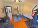 Well-equipped home gym with exercise equipment and hardwood floors providing a dedicated fitness space at 318 N Laurel N St, Lincolnton, NC 28092