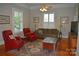 Inviting living room featuring hardwood floors, a plush sofa, and a cozy atmosphere at 318 N Laurel N St, Lincolnton, NC 28092