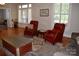 Bright living room with hardwood floors, comfortable seating, and a decorative rug at 318 N Laurel N St, Lincolnton, NC 28092