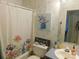 Bathroom featuring a floral theme with tub, shower, and vanity at 33343 Old Salisbury Rd, Albemarle, NC 28001