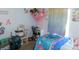Bedroom with light blue walls, and a cozy study corner by the window at 33343 Old Salisbury Rd, Albemarle, NC 28001