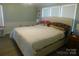 Comfortable bedroom with a large bed and plenty of natural light at 33343 Old Salisbury Rd, Albemarle, NC 28001
