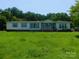 Charming single-Gathering home features a covered porch and well-maintained lawn at 33343 Old Salisbury Rd, Albemarle, NC 28001
