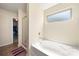 Bright bathroom features a soaking tub, tiled floor, and glass-enclosed shower at 4732 Gibbons Link Rd, Charlotte, NC 28269