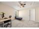 Bedroom or office with chaise lounge, desk, and ceiling fan at 4732 Gibbons Link Rd, Charlotte, NC 28269