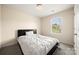Cozy bedroom with a comfortable bed and natural light from the window at 4732 Gibbons Link Rd, Charlotte, NC 28269