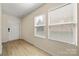 Welcoming entryway with windows offering natural light and hard surface floors at 4732 Gibbons Link Rd, Charlotte, NC 28269