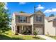 Charming two-story home with stone accents and a well-maintained front yard at 4732 Gibbons Link Rd, Charlotte, NC 28269