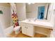 Bathroom features a white vanity with drawers and cabinets and a shower tub with a floral shower curtain at 6313 Woodland Commons Dr, Charlotte, NC 28269