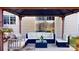 Covered gazebo featuring lounge seating for outdoor relaxation and entertaining in the backyard at 6313 Woodland Commons Dr, Charlotte, NC 28269