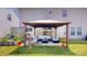Backyard patio featuring a cozy gazebo with comfortable seating area, perfect for relaxing at 6313 Woodland Commons Dr, Charlotte, NC 28269