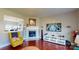 Cozy living room with a fireplace and hardwood floors at 6313 Woodland Commons Dr, Charlotte, NC 28269