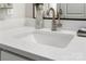 Bathroom featuring stylish stone countertop, modern sink, and a sleek faucet at 7516 O'Hara St, Huntersville, NC 28078