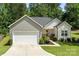 Lovely single-Gathering home with a two-car garage, and well-manicured lawn at 7516 O'Hara St, Huntersville, NC 28078