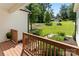 Inviting front porch with view of well-maintained lawn and trees at 7516 O'Hara St, Huntersville, NC 28078