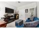 Cozy living area with modern entertainment setup and stylish furnishings at 7516 O'Hara St, Huntersville, NC 28078