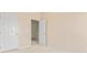 Bedroom with a white door opening up to the home's living spaces at 7612 Turley Ridge Ln, Charlotte, NC 28273