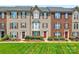 Charming townhomes with landscaped front yards and classic architectural details at 7612 Turley Ridge Ln, Charlotte, NC 28273
