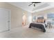 A serene main bedroom features a tray ceiling, neutral tones, and ample natural light at 7612 Turley Ridge Ln, Charlotte, NC 28273