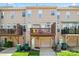 Rear view of a townhome with wooden decks and convenient garage access at 7612 Turley Ridge Ln, Charlotte, NC 28273
