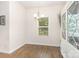 Dining room featuring wood flooring, a cabinet, and a chandelier at 8330 Kneller St, Charlotte, NC 28215