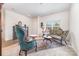 Comfortable living room featuring an ornate rug, a loveseat, and a side chair at 8330 Kneller St, Charlotte, NC 28215