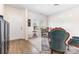 Living room featuring wood flooring, an ornate rug, a loveseat, and a side chair at 8330 Kneller St, Charlotte, NC 28215