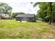 Spacious backyard with a new patio and lush green lawn, perfect for outdoor living at 1005 8Th Sw Ave, Conover, NC 28613