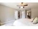 Bedroom with soft carpet and ceiling fan, featuring an open closet at 1005 8Th Sw Ave, Conover, NC 28613