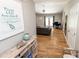 Inviting foyer leading into a living area with hardwood floors, neutral walls, and ample natural light from the living space at 1005 8Th Sw Ave, Conover, NC 28613