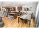 Open concept kitchen and dining area features a center island with granite countertop, stainless steel appliances, and seating at 1005 8Th Sw Ave, Conover, NC 28613
