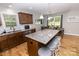 Open concept kitchen and dining area features a center island with granite countertop, stainless steel appliances, and seating at 1005 8Th Sw Ave, Conover, NC 28613