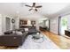 Open-concept living room, with hardwood floors, high ceilings, and seamless flow to the kitchen and dining area at 1005 8Th Sw Ave, Conover, NC 28613