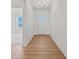 Bright foyer with wood flooring, white trim, and a view into the house through the doorway at 1006 Kinship Dr # 120, Lancaster, SC 29720
