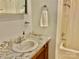 Bathroom featuring a single sink vanity with laminate top, a shower and updated fixtures at 1010 Macarthur Rd, Albemarle, NC 28001