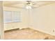 Neutral bedroom with carpeted floors, ceiling fan, and natural light from a window at 1010 Macarthur Rd, Albemarle, NC 28001