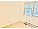 Basic bedroom with carpet flooring, a window, and electrical outlets at 1010 Macarthur Rd, Albemarle, NC 28001