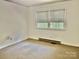 Bedroom featuring a window, neutral walls, and carpeted floors at 1010 Macarthur Rd, Albemarle, NC 28001