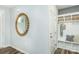 Home entryway featuring a decorative mirror, coat hooks, bench and a 'For Sale' sign on the floor at 1022 Kinship Dr # 118, Lancaster, SC 29720