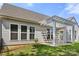 Well-maintained home with a covered patio, fenced yard and lots of windows offering a great view of outdoors at 1031 Fants Grove Ln, Indian Land, SC 29707