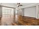 Spacious living room featuring gleaming hardwood floors and neutral paint palette, ideal for relaxation at 1031 Fants Grove Ln, Indian Land, SC 29707