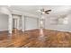 Open-concept living room featuring hardwood floors and neutral paint scheme at 1031 Fants Grove Ln, Indian Land, SC 29707