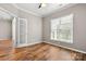 Home office features a glass door and large window at 1031 Fants Grove Ln, Indian Land, SC 29707