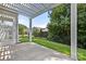 Relaxing covered patio and a view of the lush backyard, ideal for outdoor lounging and entertaining at 1031 Fants Grove Ln, Indian Land, SC 29707