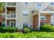 Exterior of condo with balconies and well-manicured landscaping at 10614 Hill Point Ct, Charlotte, NC 28262