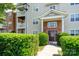 Inviting condo exterior with well-maintained landscaping and private balcony at 10614 Hill Point Ct, Charlotte, NC 28262
