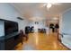 Hardwood floors complement this open concept living room adjacent to the kitchen and dining areas at 10614 Hill Point Ct, Charlotte, NC 28262
